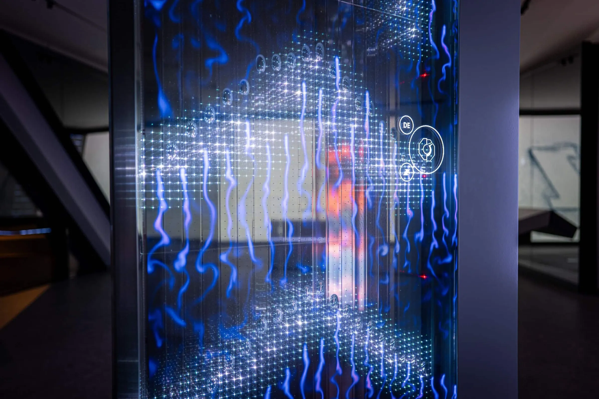 Display developed by Garamantis combines LED film, glycerin pools, and transparent OLED touchscreens