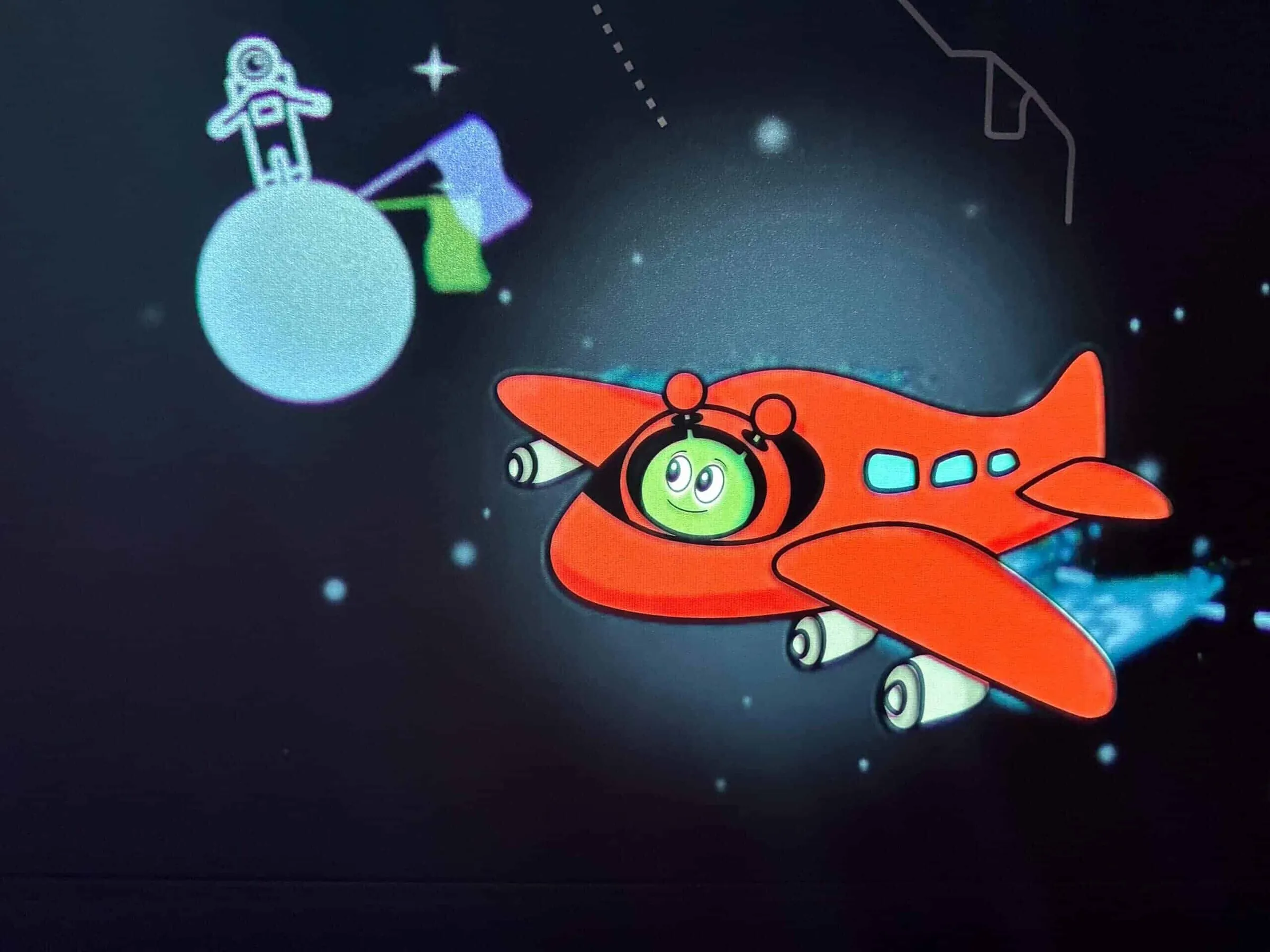 Space mascot "Paxi" on an interactive projection screen